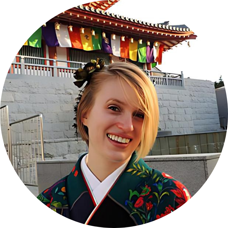 Kelsey Lechner wearing a kimono and smiling toward the camera.