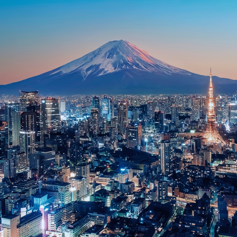 Mt. Fuji rising over the skyline of the city of Tokyo, Japan.